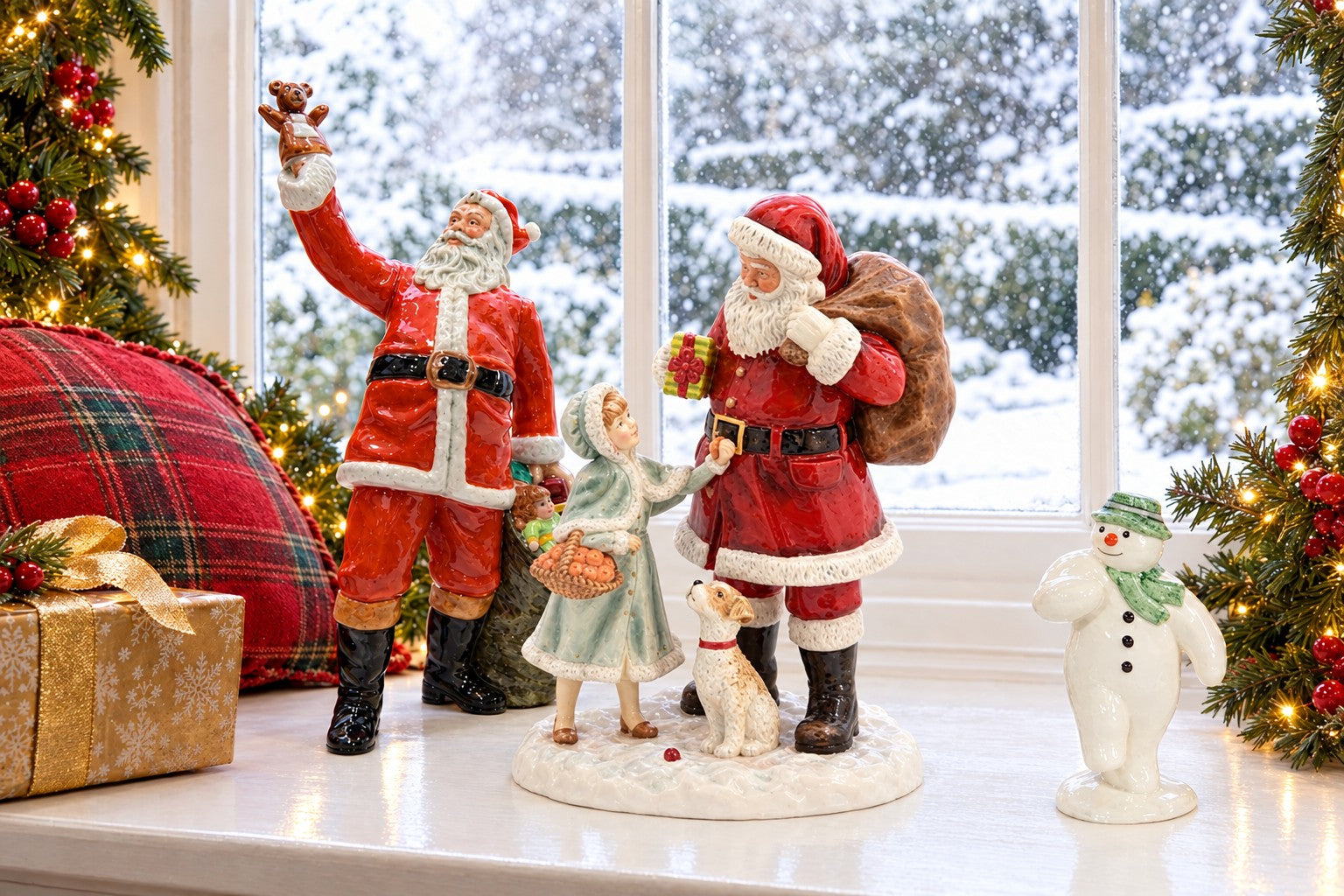 Royal Doulton Santa Claus, A Gift for Santa and The Snowman on a window seat with snow falling outside