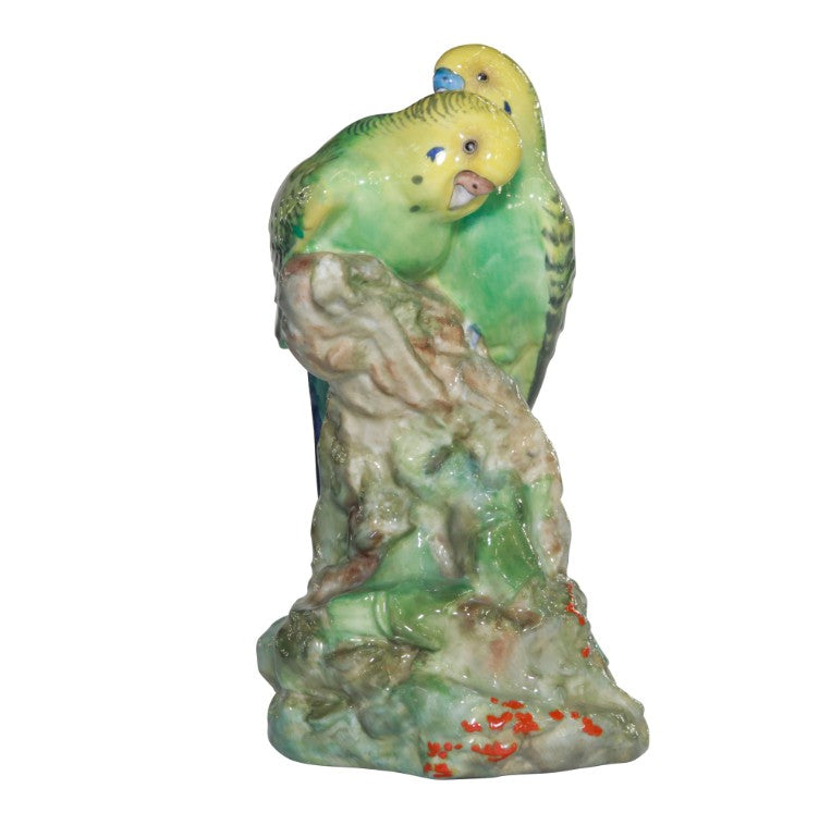 Budgerigars on a tree stump animal figurine