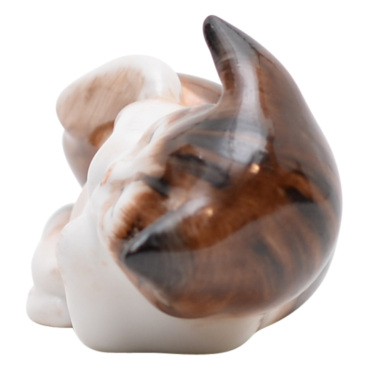 Kitten lying on back sculpture