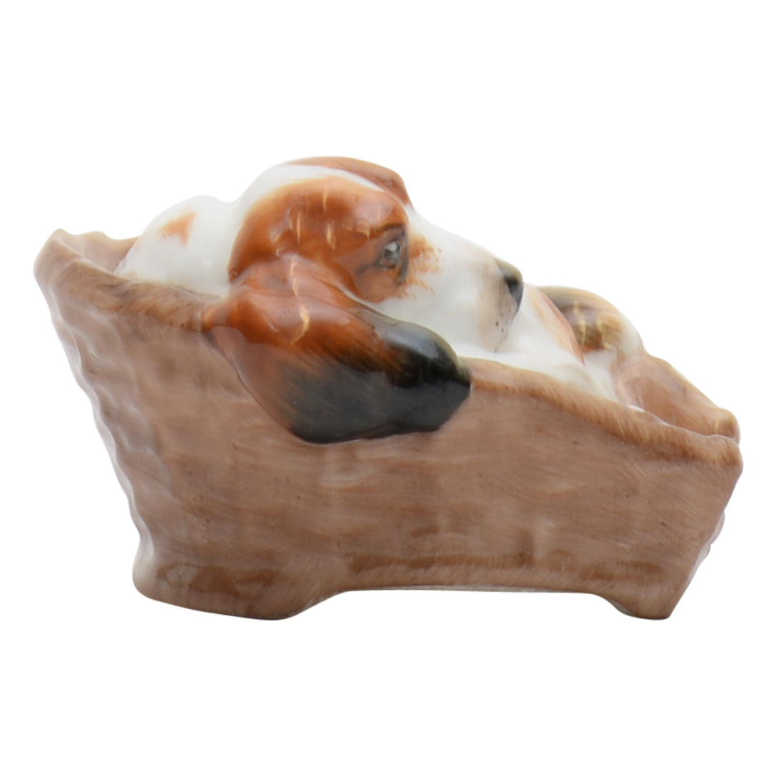 Cocker Spaniel Lying in Basket dog sculpture