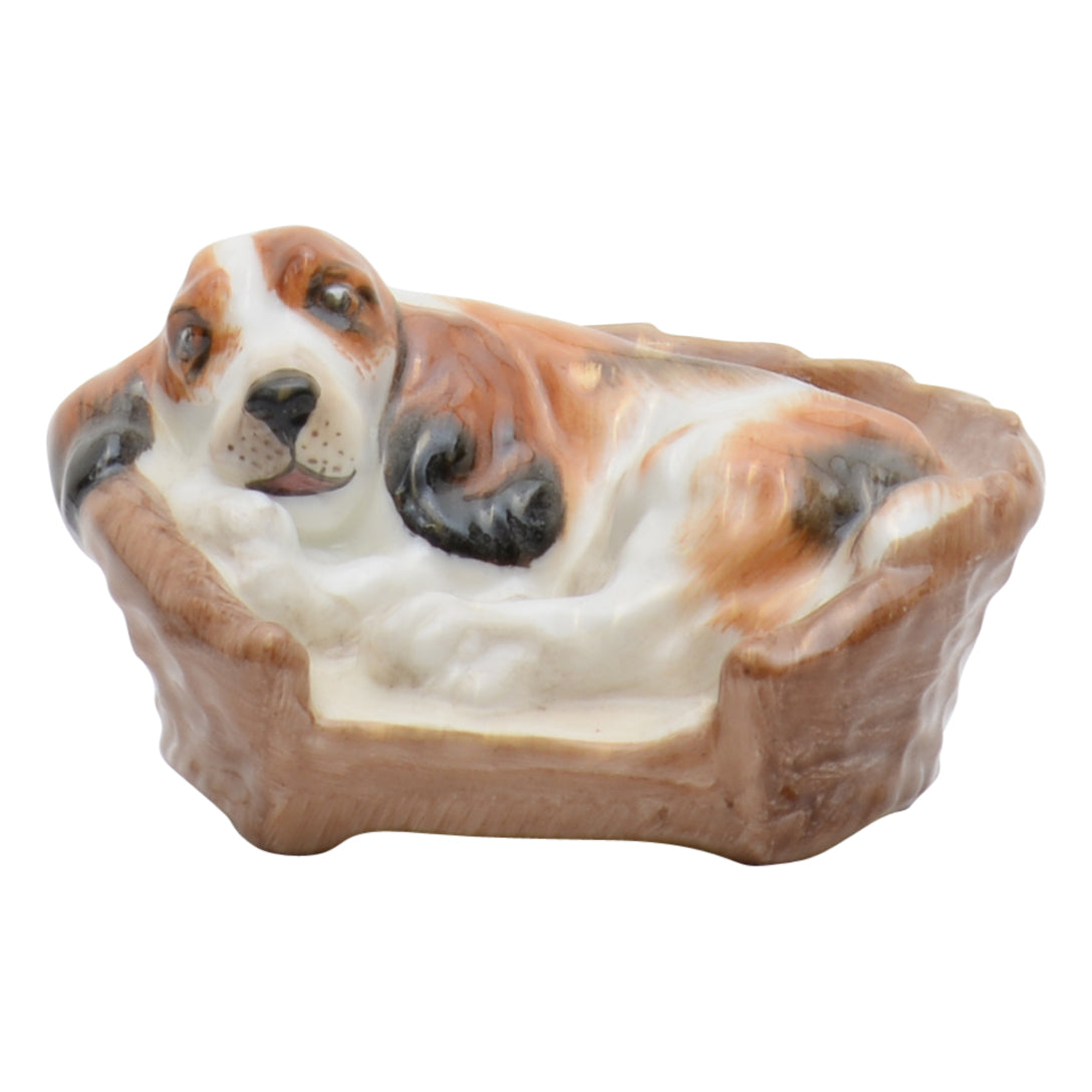 Cocker Spaniel Lying in Basket dog sculpture