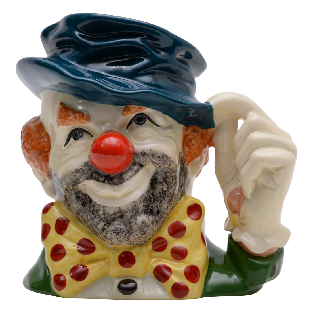 Clown teal hat yellow and red bow tie white glove and orange hair