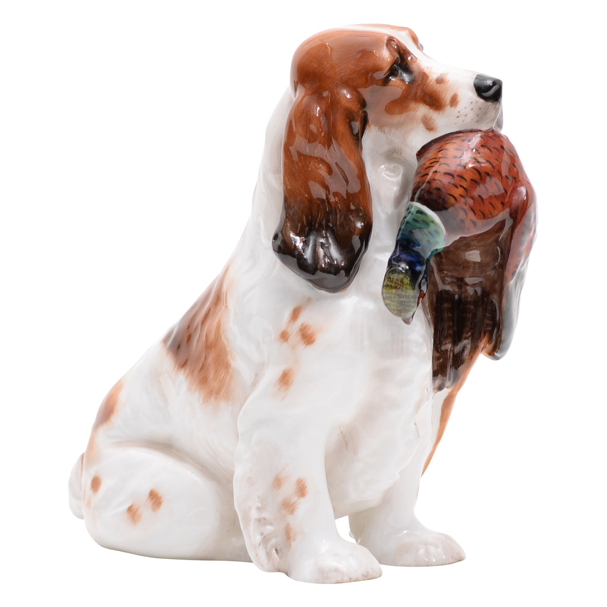 Cocker spaniel with pheasant animal figurine