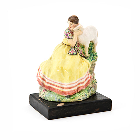 Dulwich figure,girl with lamb on rock,,h. 2.5"