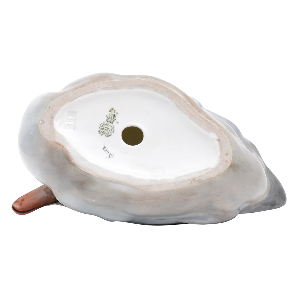Drake resting animal figurine