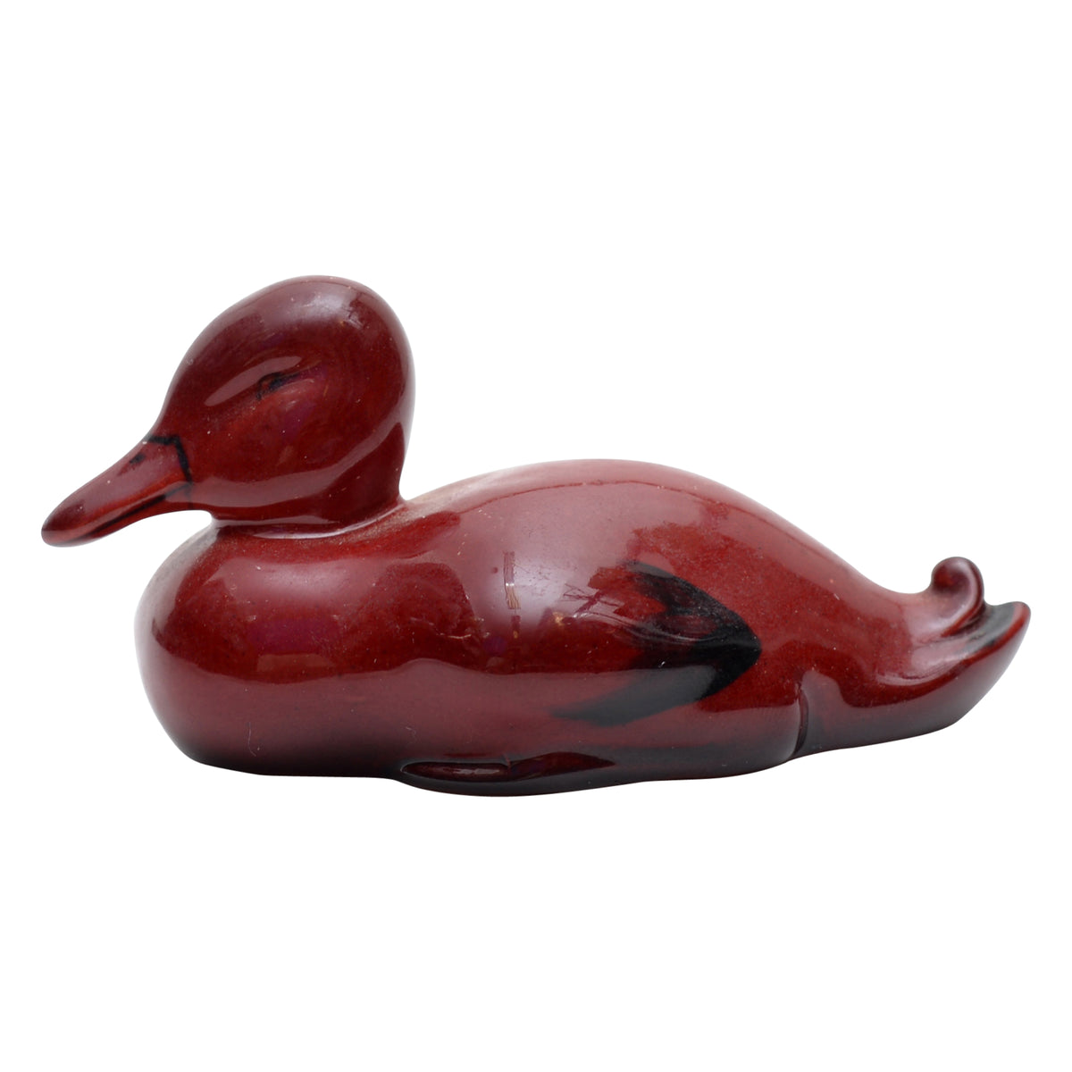 Duck resting figurine