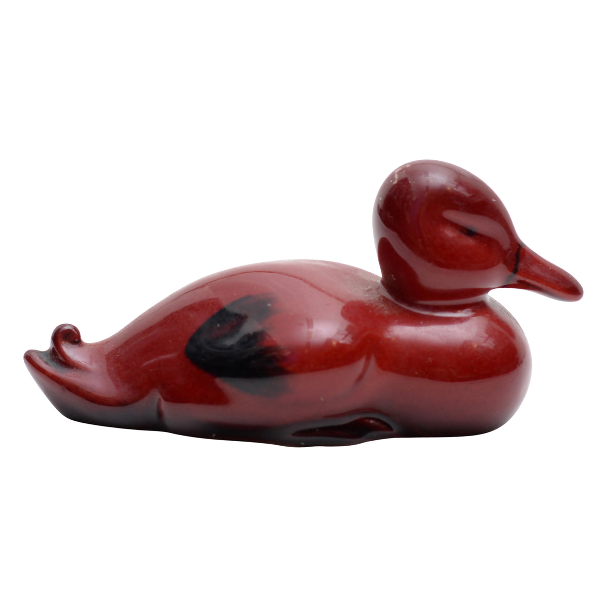 Duck resting figurine