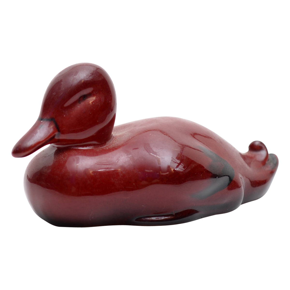Duck resting figurine