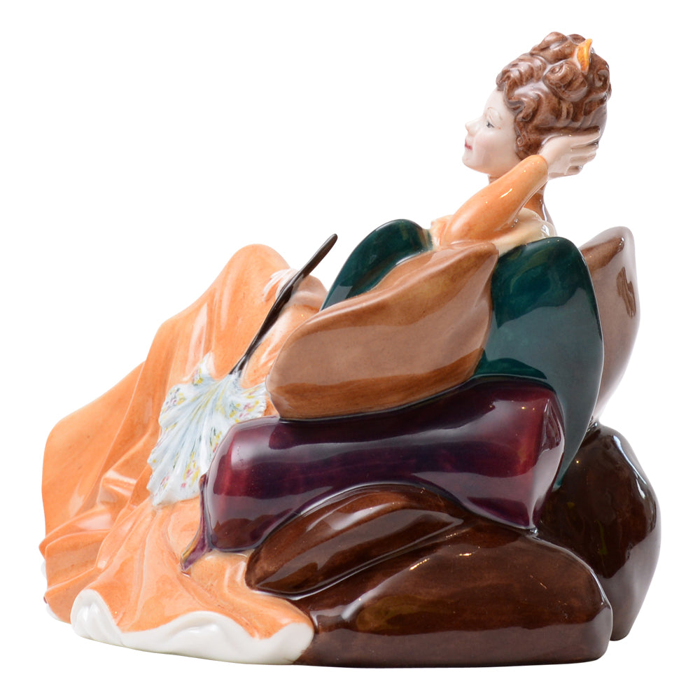 Lady Sitting On Sofa