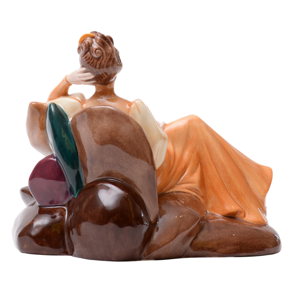 Lady Sitting On Sofa