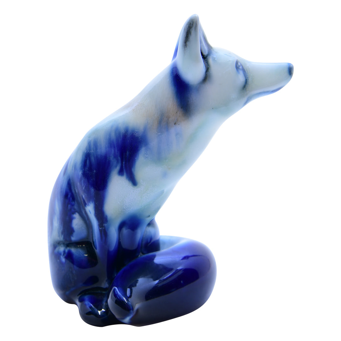 Blue Flambe Fox Sitting