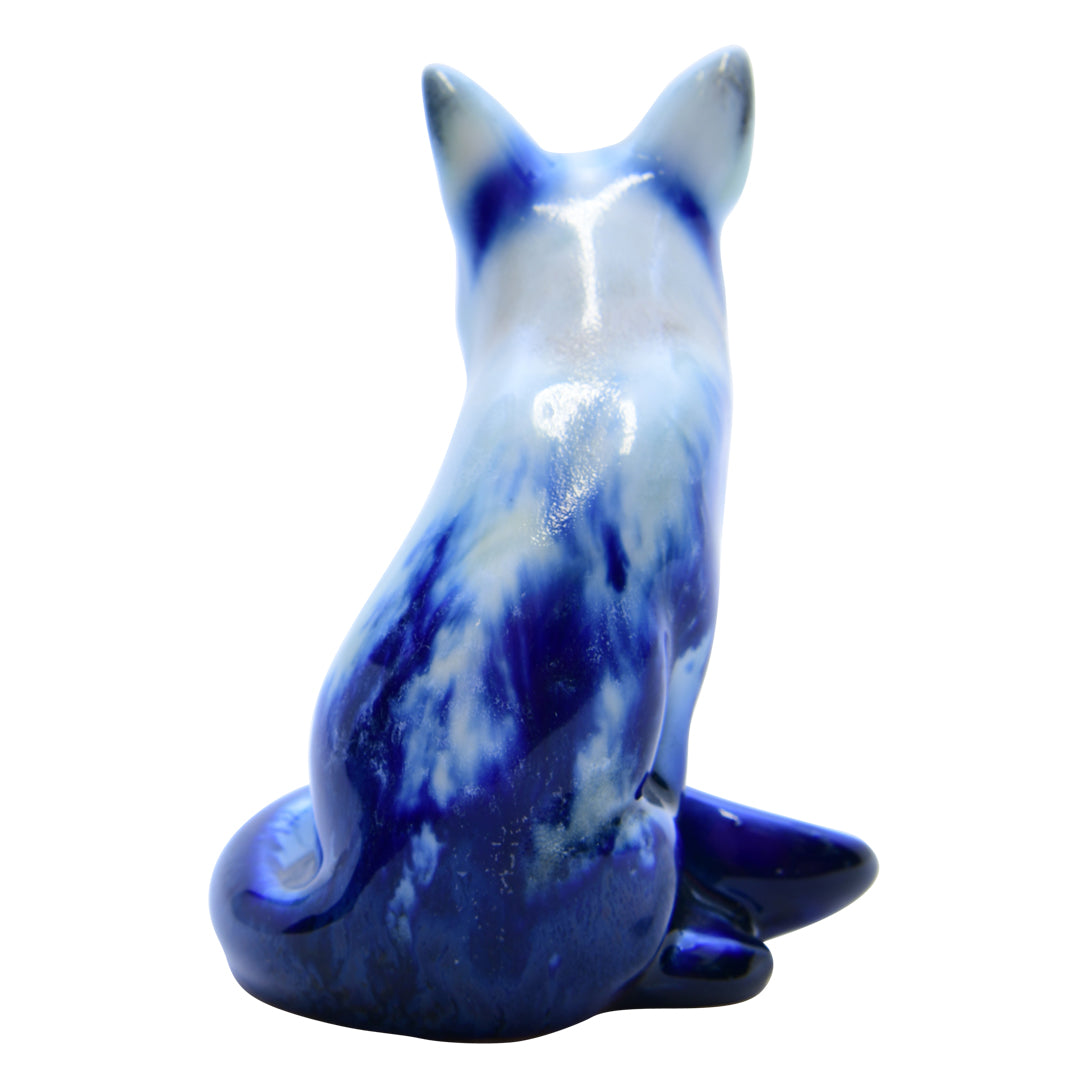 Blue Flambe Fox Sitting