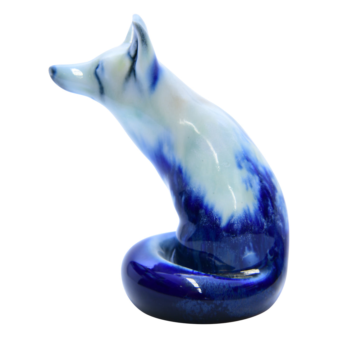 Blue Flambe Fox Sitting