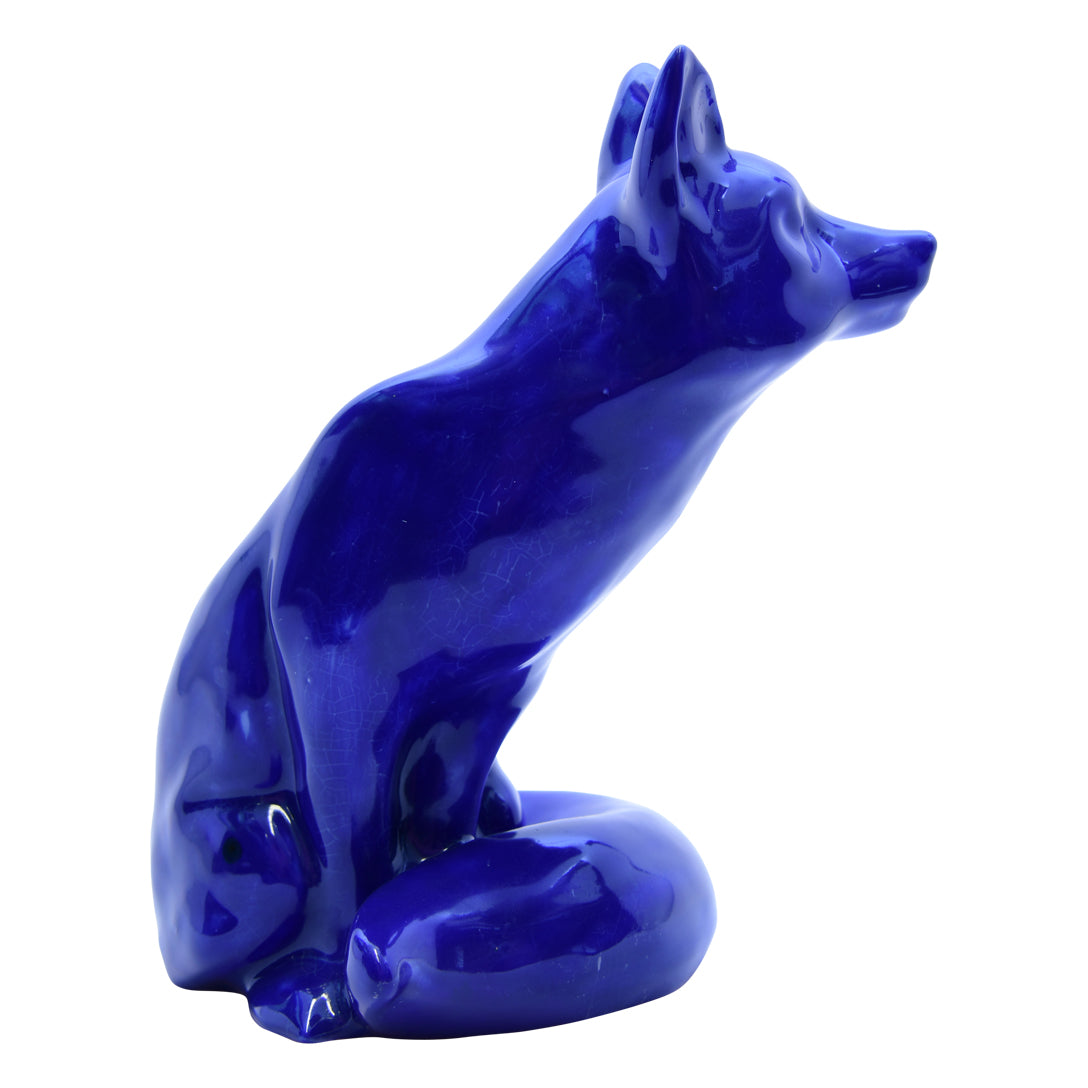 Blue Flambe Fox Sitting