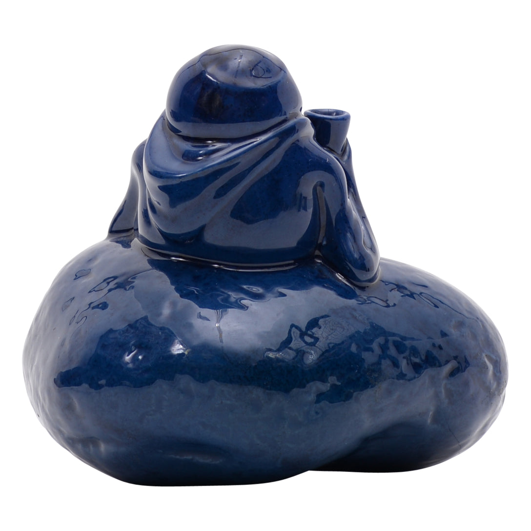 Grotesque man on blue potato