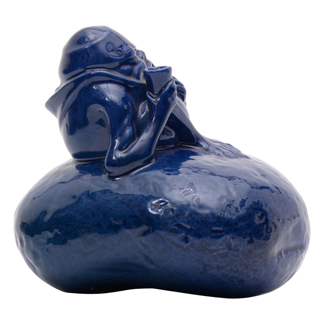 Grotesque man on blue potato
