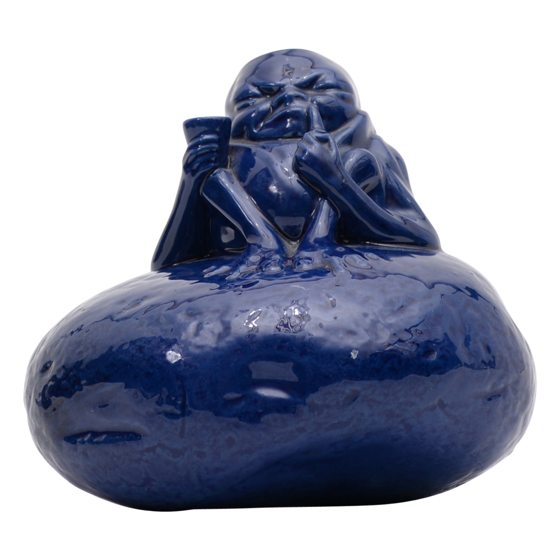 Grotesque man on blue potato