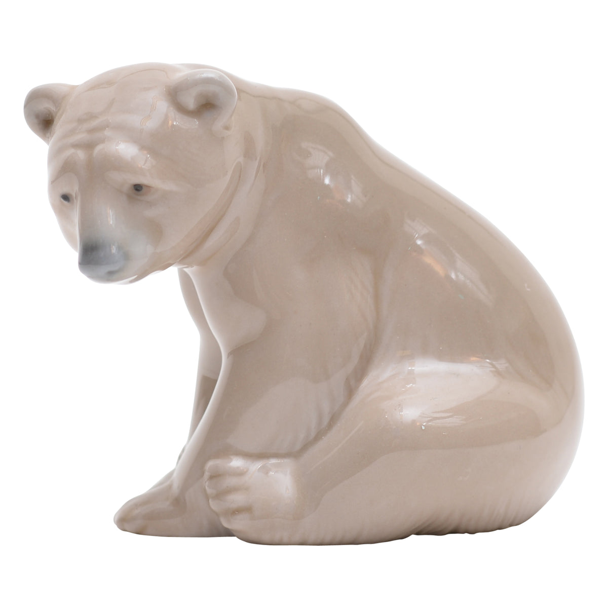 Seated polar bear sculpture