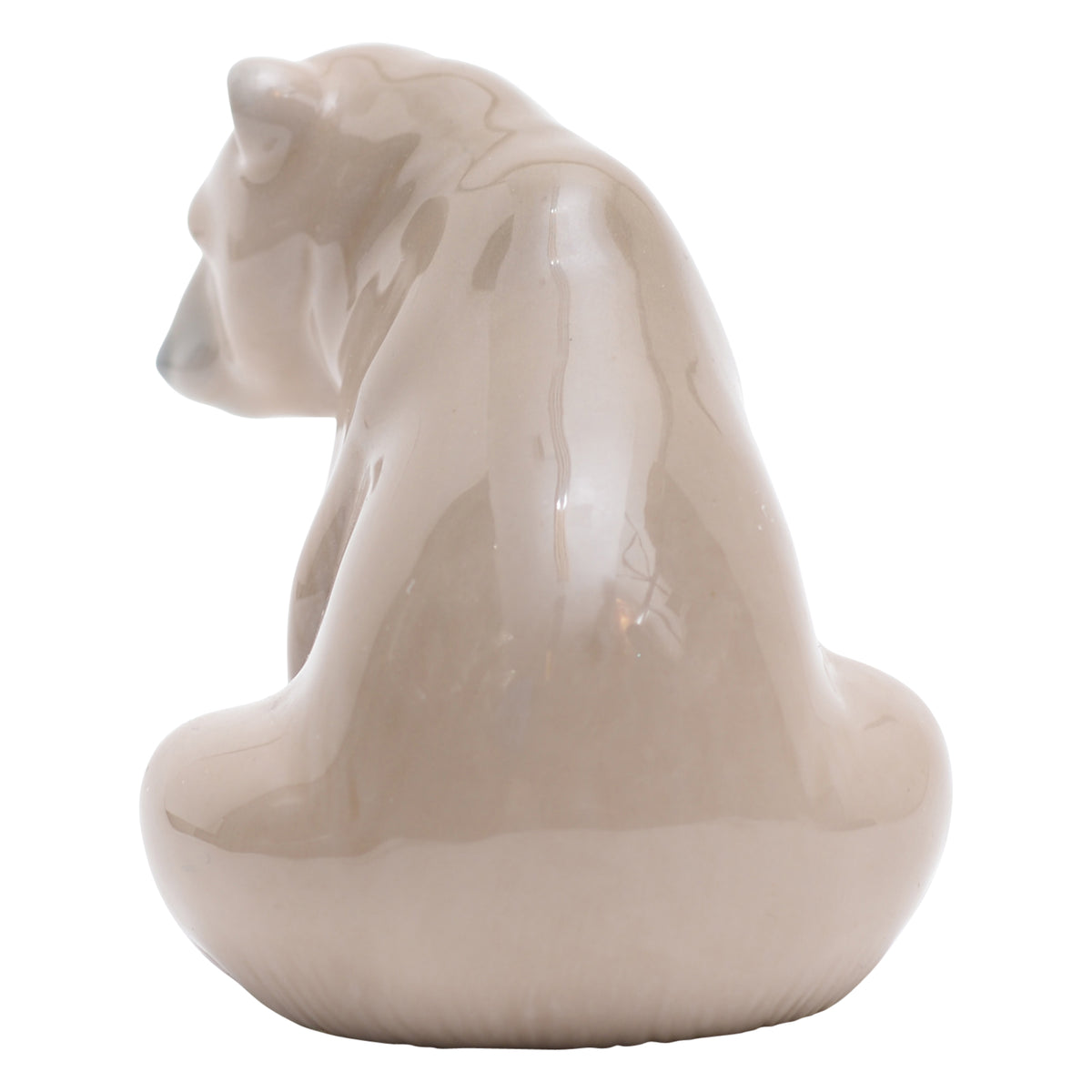 Seated polar bear sculpture