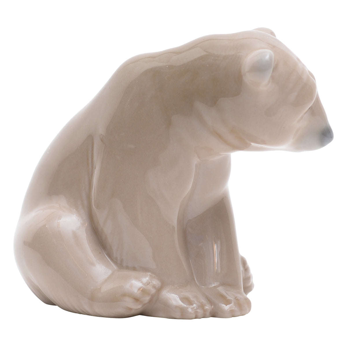 Seated polar bear sculpture