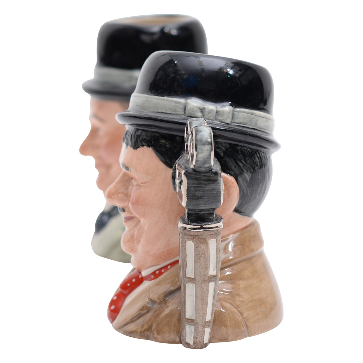 Pair of Stan Laurel & Oliver Hardy character jugs