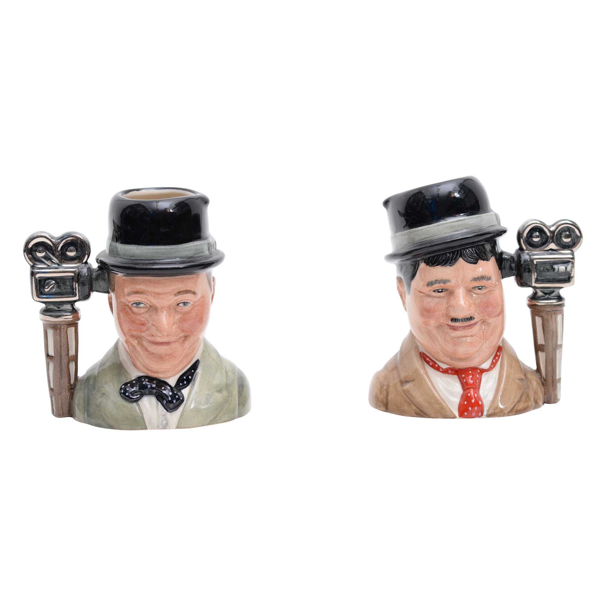 Pair of Stan Laurel & Oliver Hardy character jugs