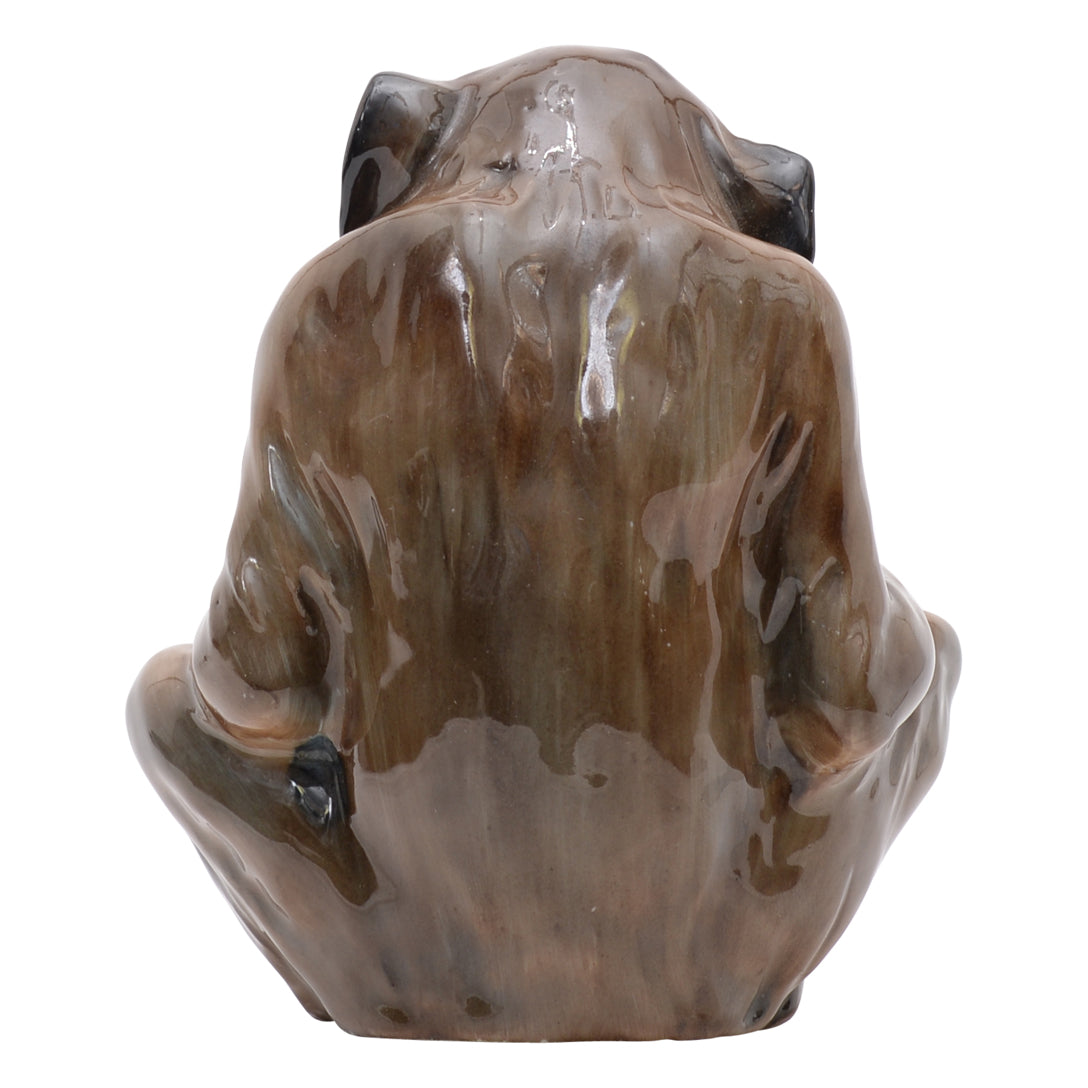 Monkey reading a book sculpture