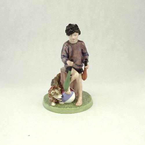 Proto,circus boy,juggling pins in hands,foot on ball,circus dog,
