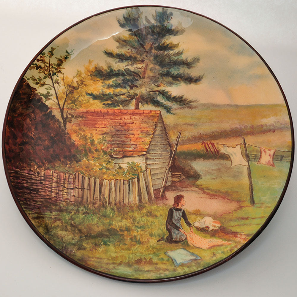 Woman with Laundry Plaque