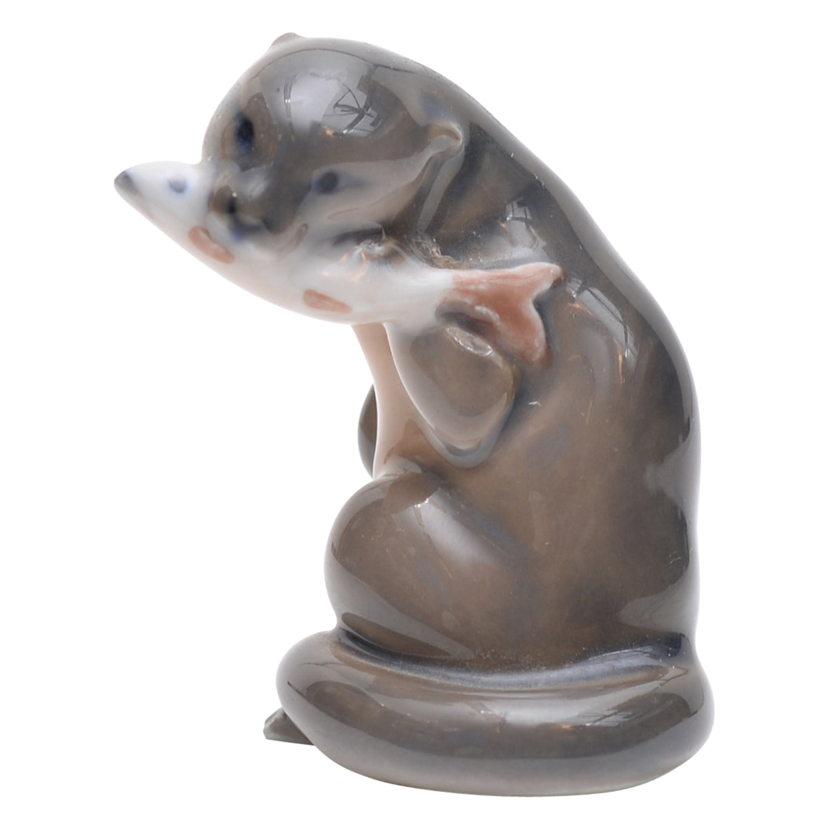 Otter with fish figurine