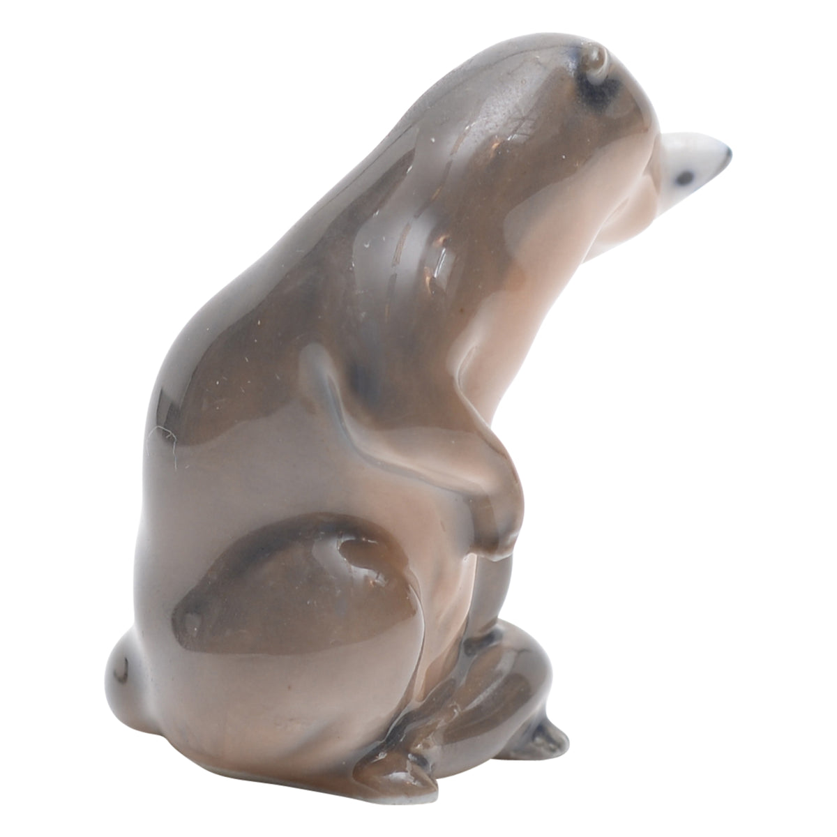 Otter with fish figurine