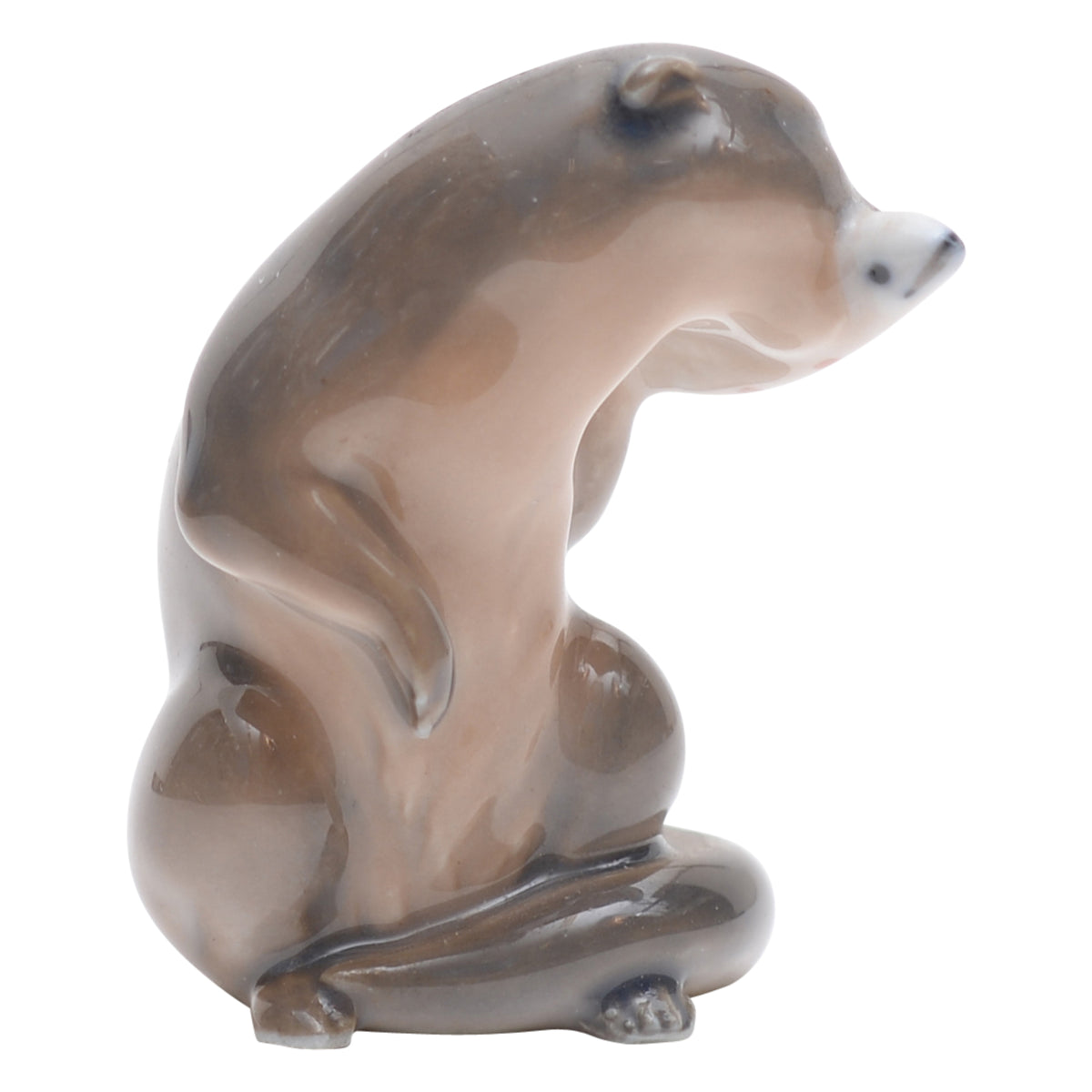 Otter with fish figurine
