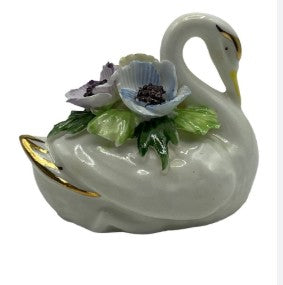 Swan with flowers sculpture