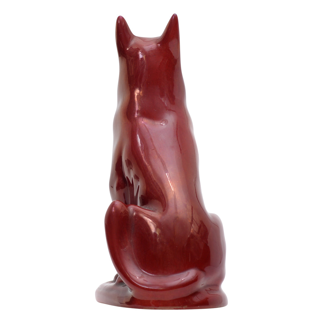 German dog seatting flambe sculpture