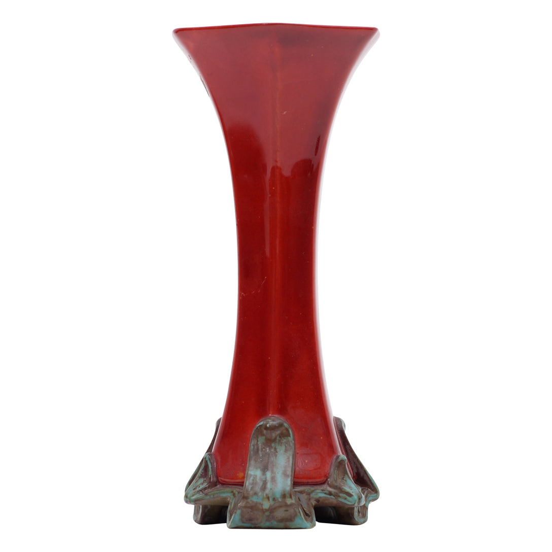 Sol au fleur,six part flat sided trumpet shape flambe vase on four footed base,