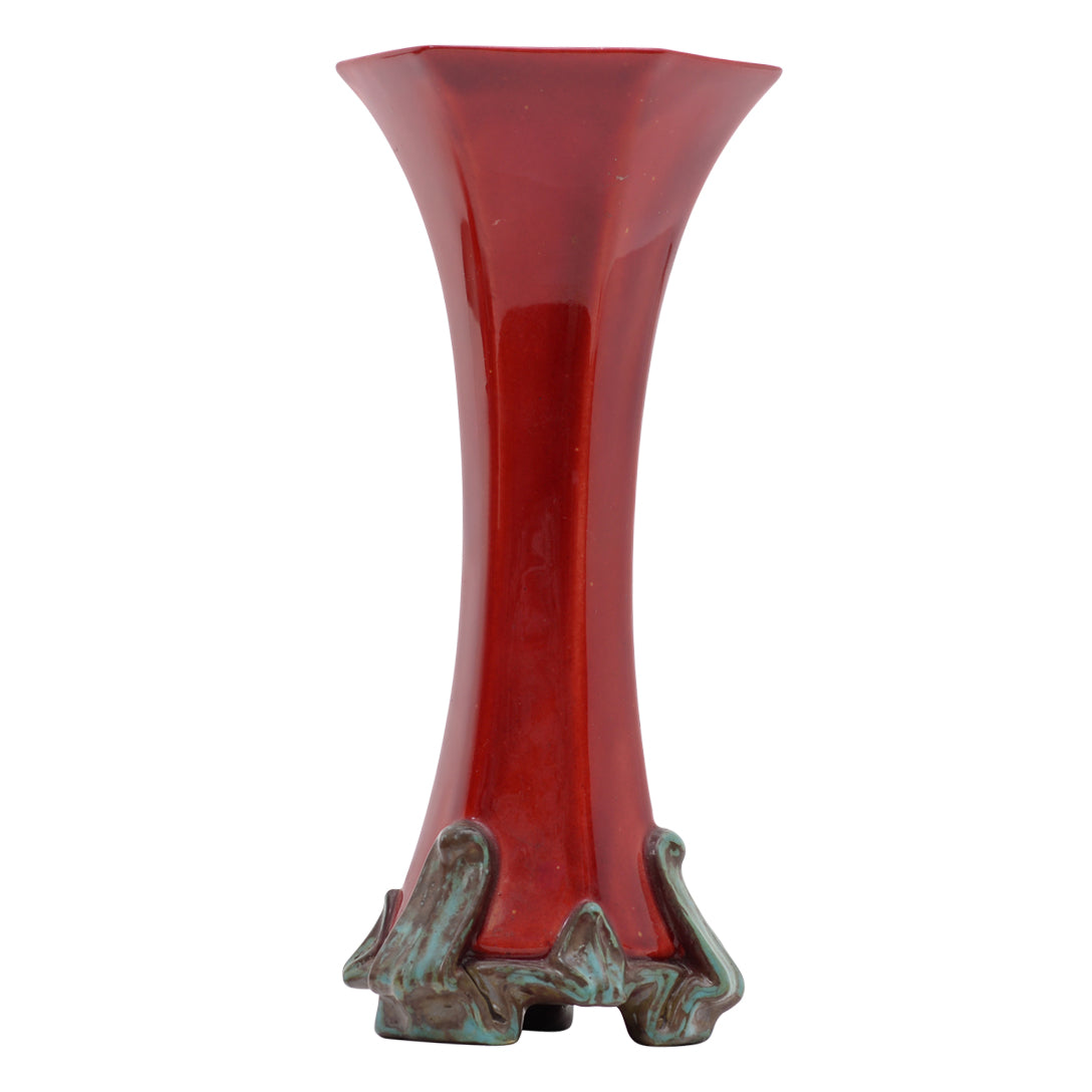 Sol au fleur,six part flat sided trumpet shape flambe vase on four footed base,