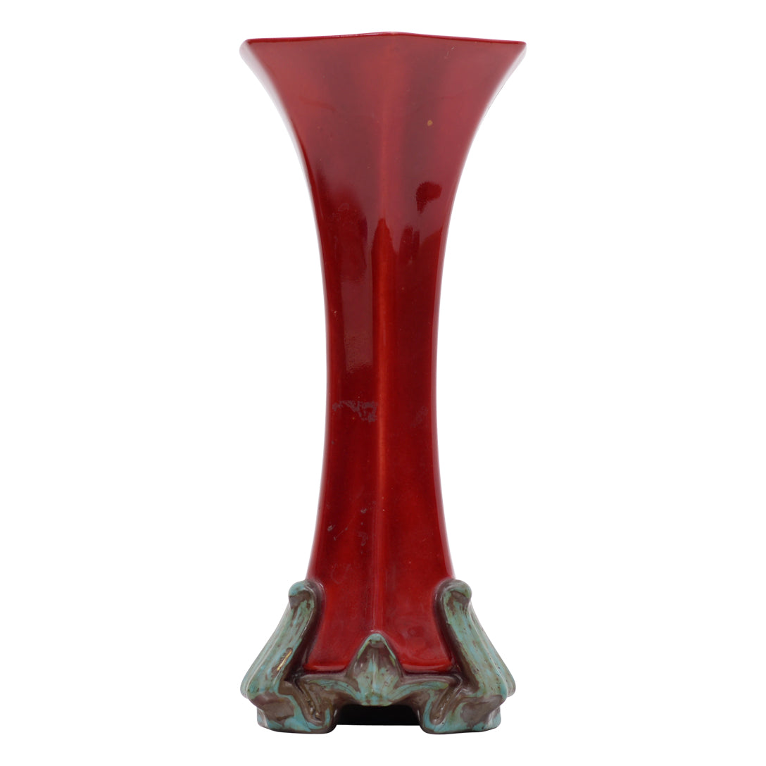 Sol au fleur,six part flat sided trumpet shape flambe vase on four footed base,
