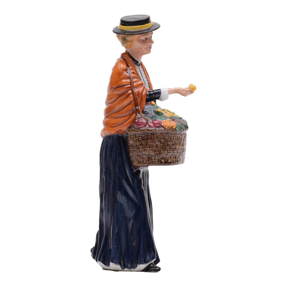 Prototype,flower vendor,black hat w yel band,org shawl,offers yel rose, basket of multi flowers,blue dress,