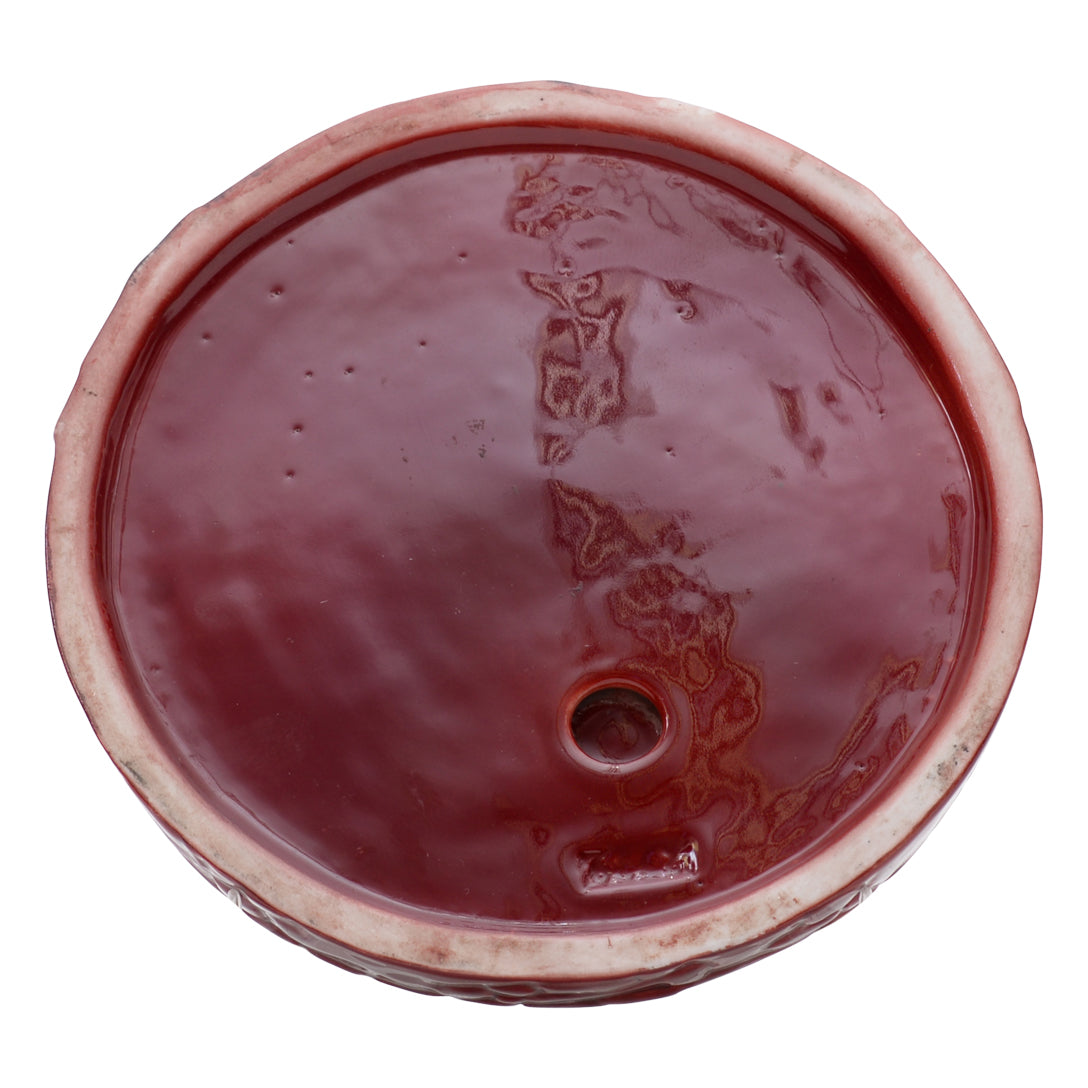 Woman flambe coin dish