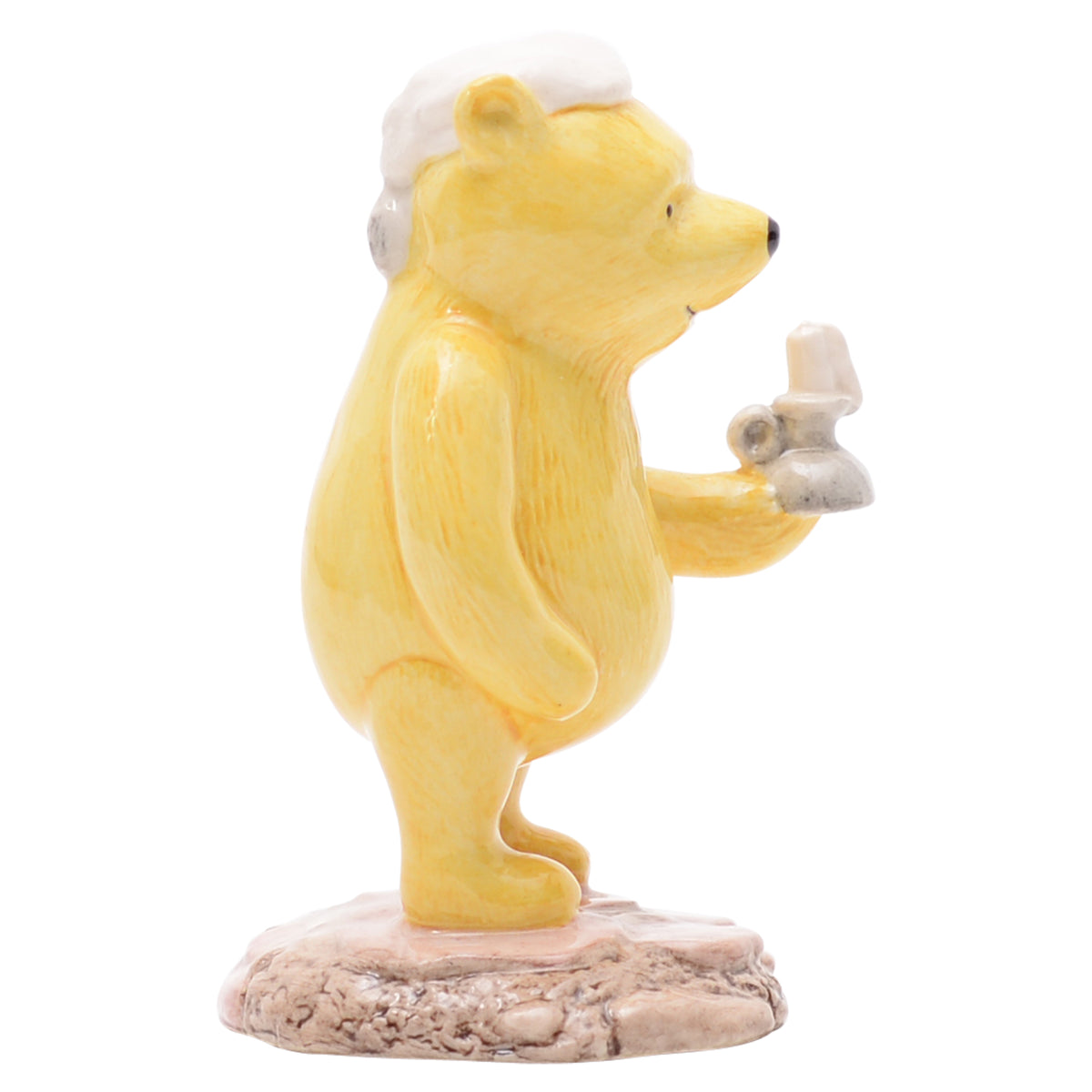 Pooh Lights the Candle bear sculpture