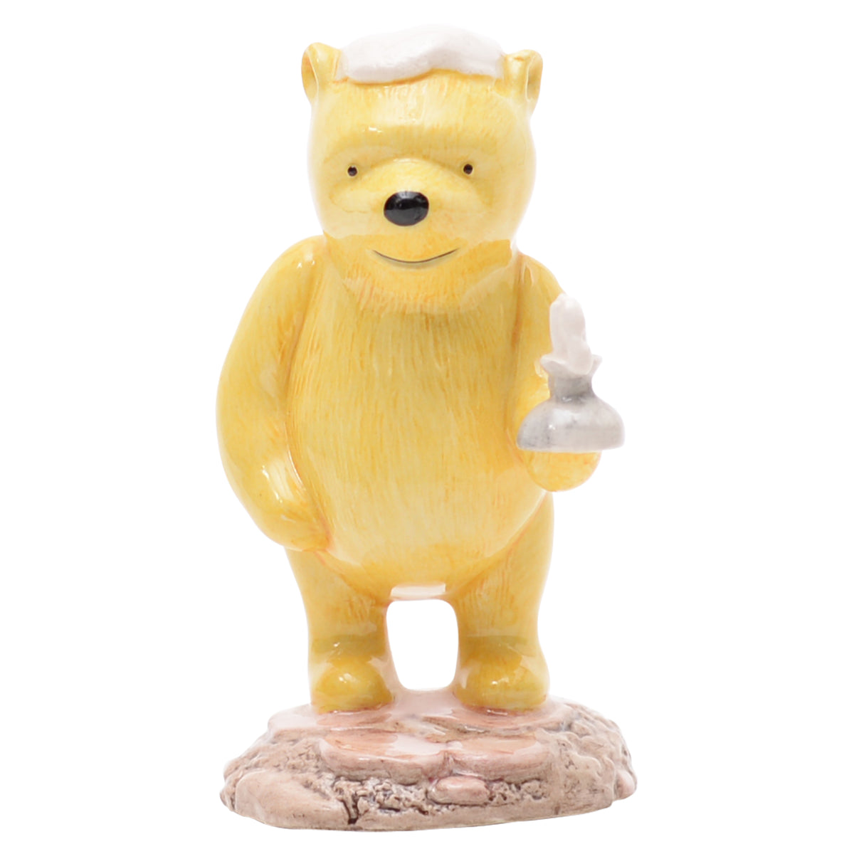 Pooh Lights the Candle bear sculpture