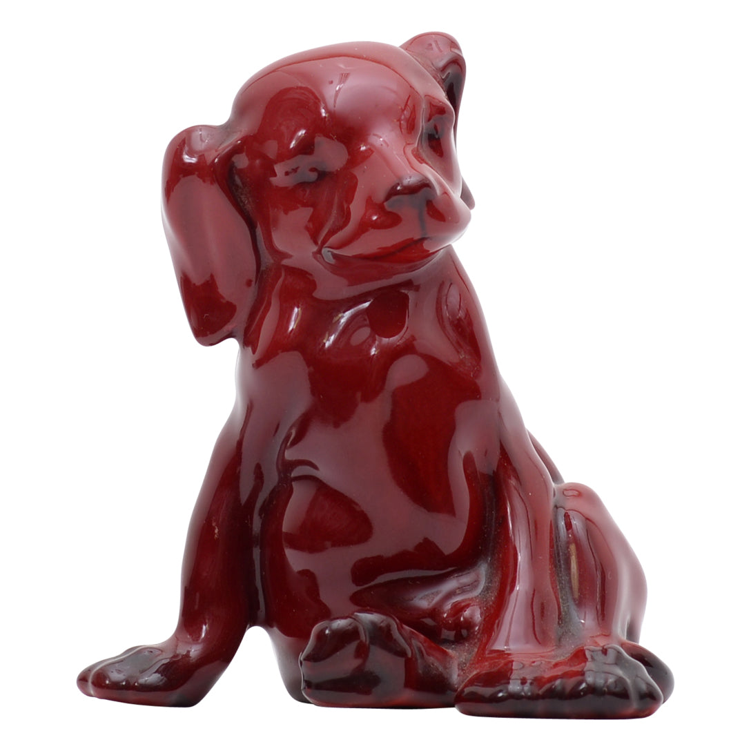 seated puppy flambe sculpture