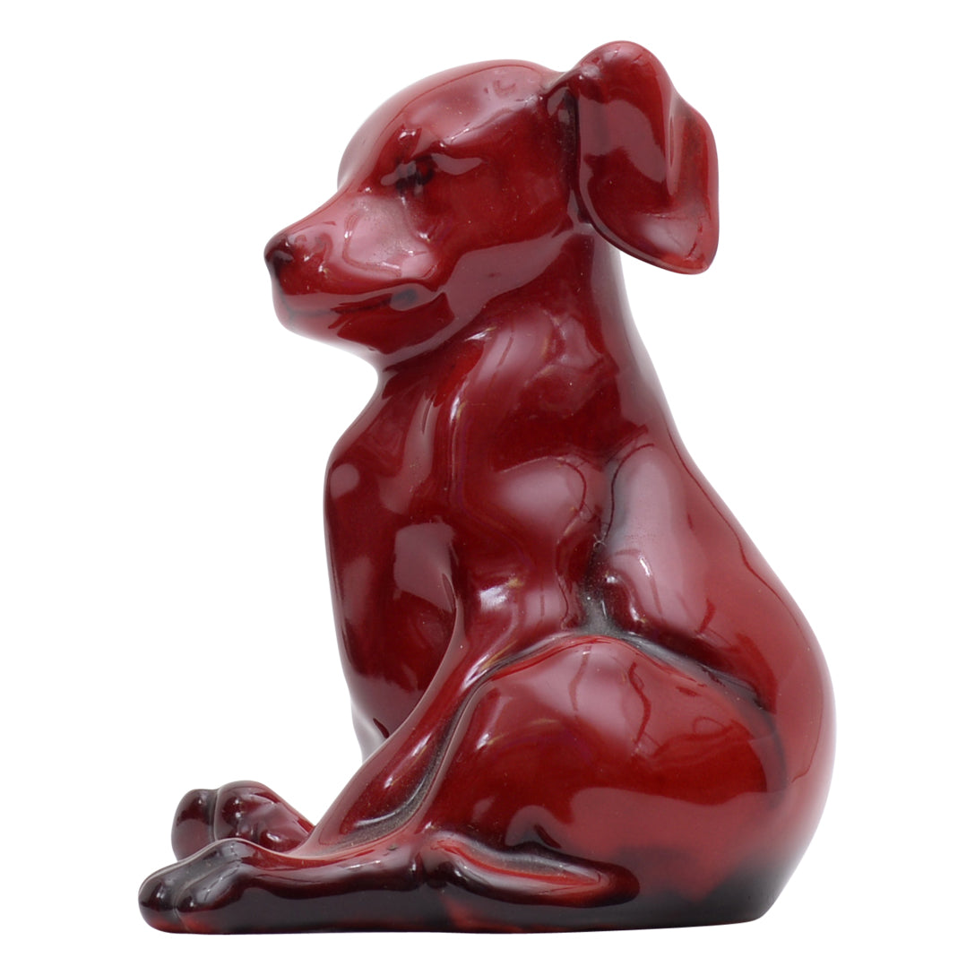 seated puppy flambe sculpture