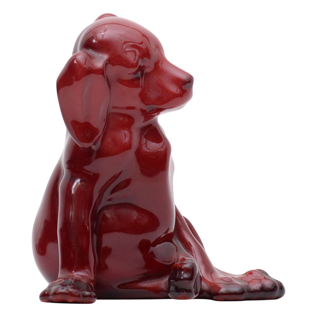 seated puppy flambe sculpture