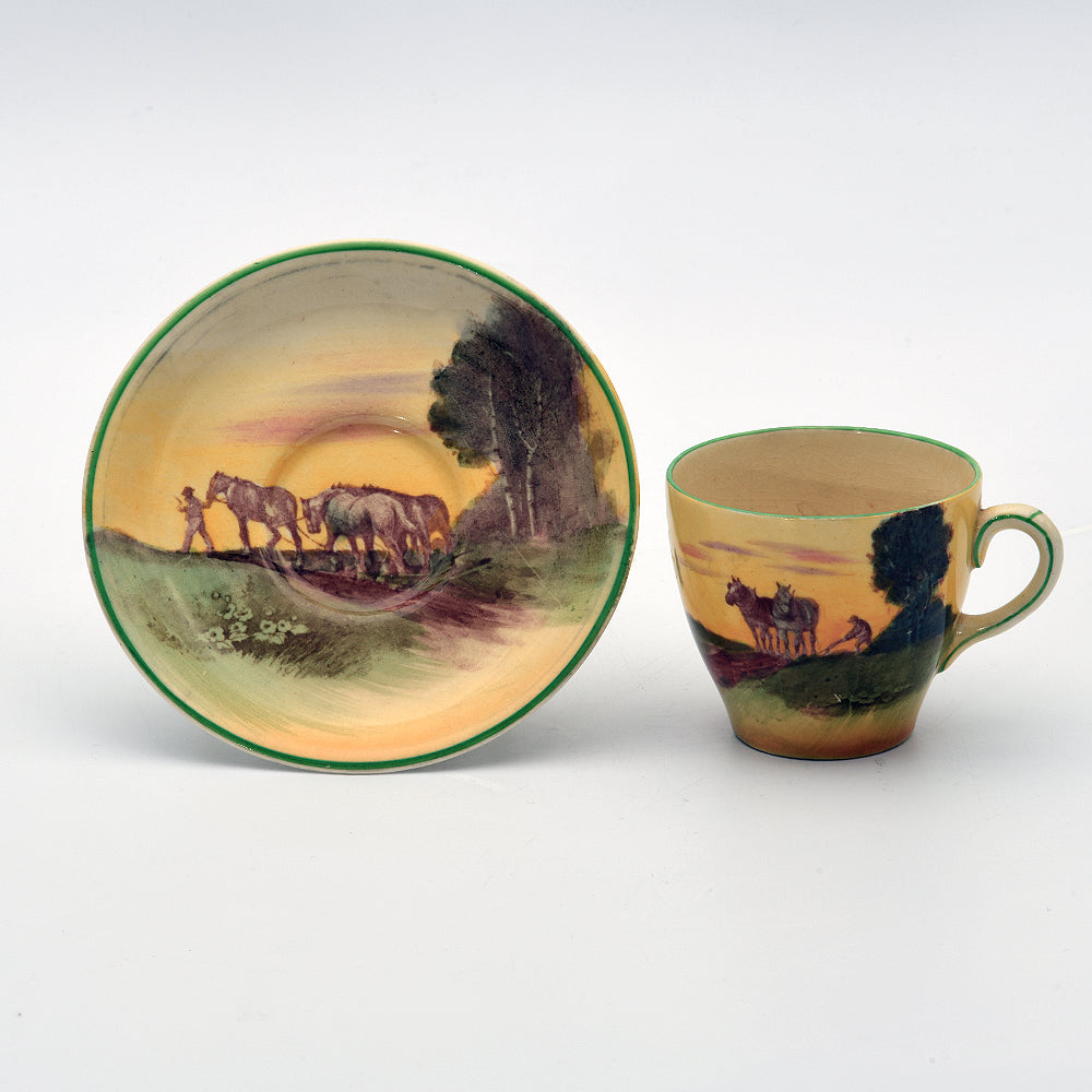 Cup and saucer ,farmer ploughing
