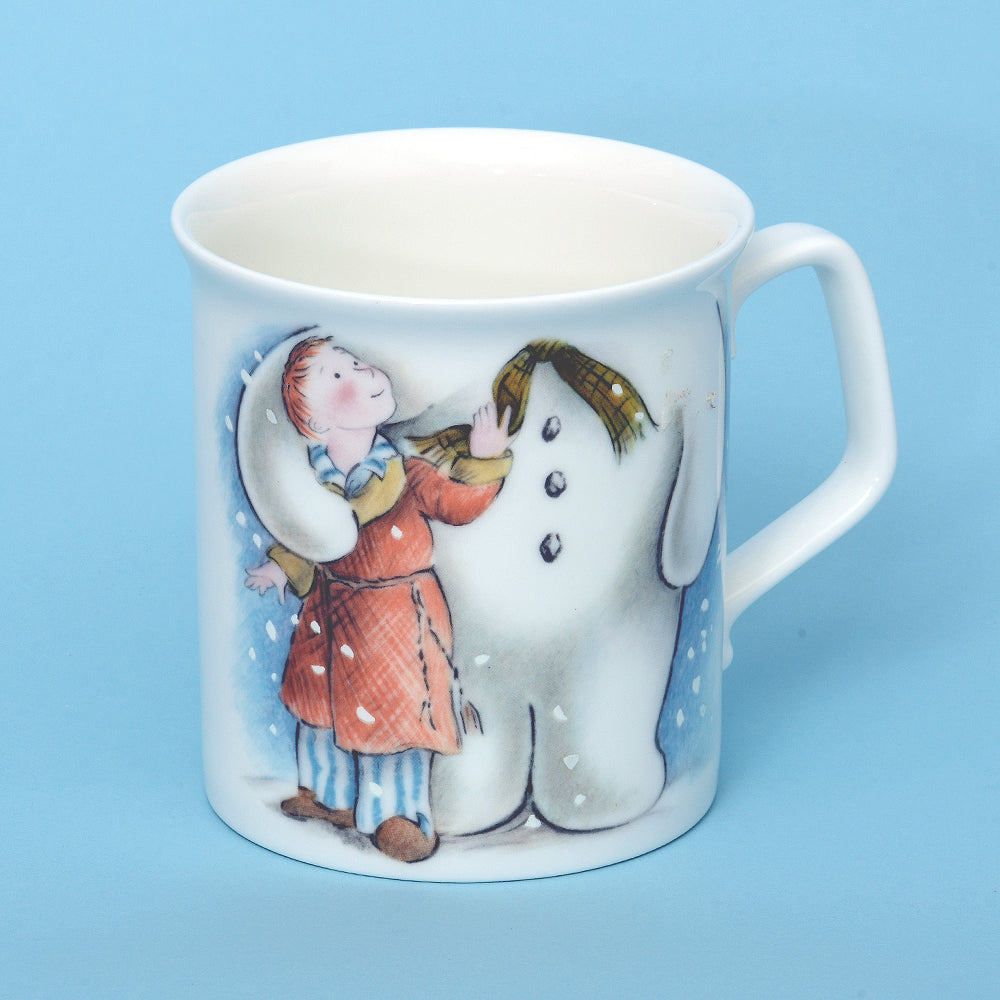 Snowman mug hugging a kid