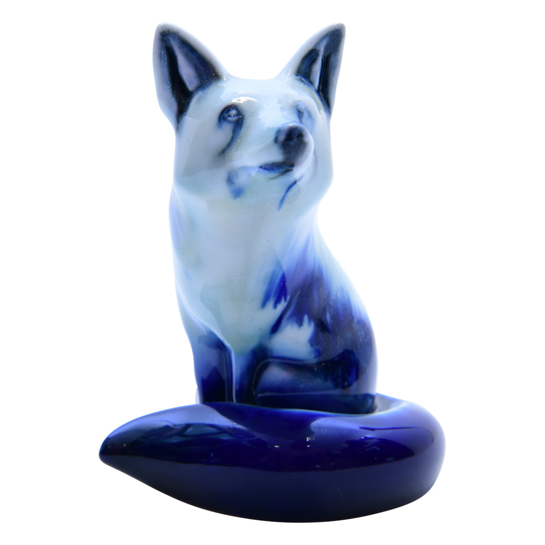 Blue Flambe Fox Sitting